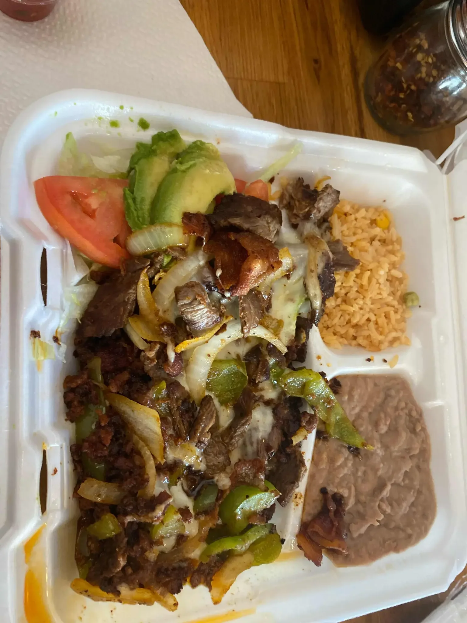 Alambres - Sizzling skillet of grilled meats and vegetables