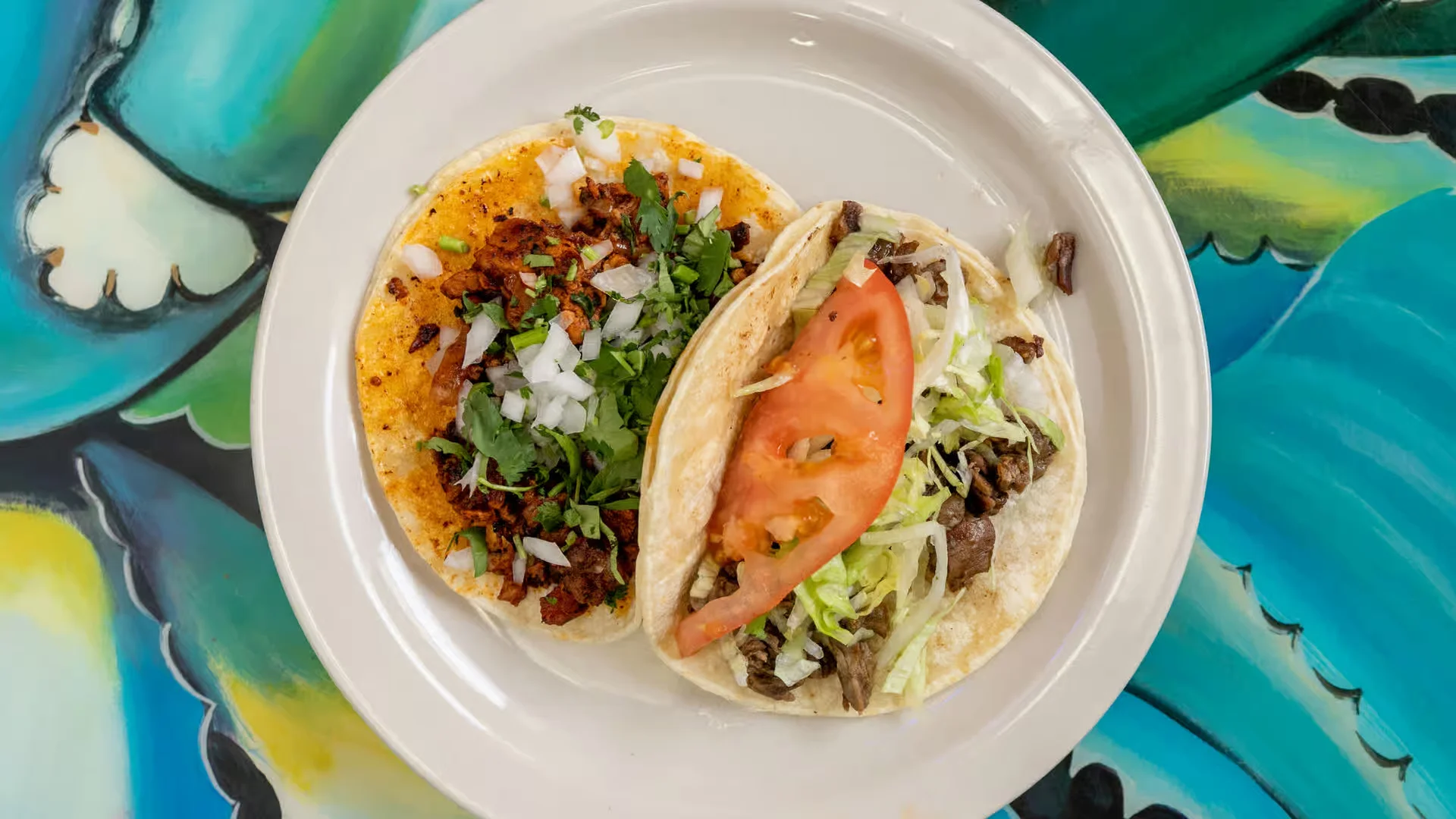 Crispy Taco - Golden fried taco shell filled with seasoned beef, lettuce, and cheese